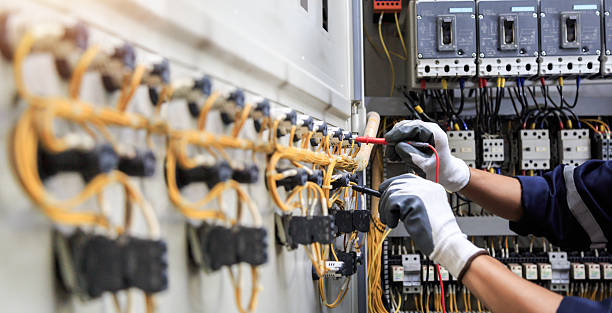 Professional Electrician technician working in Deenwood, GA